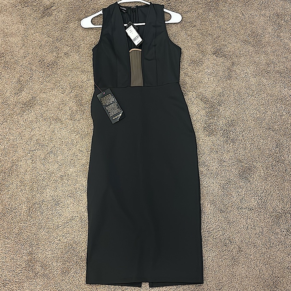 Bebe Illusion Mesh Scuba Dress. NWT, never worn. Smoke & animal free home.